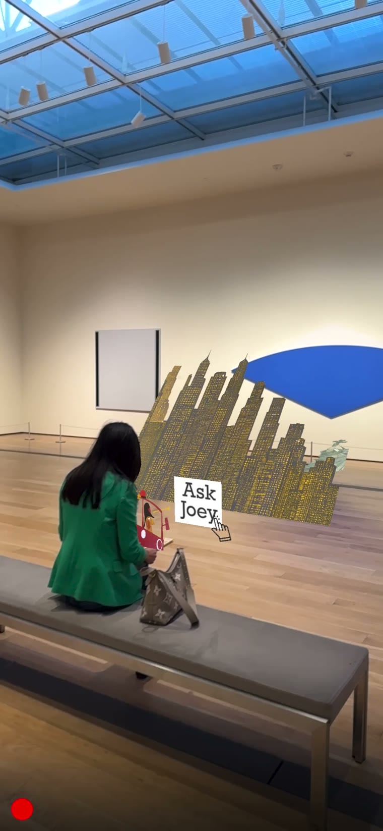 Gallery scene with Statue of Liberty and a visitor