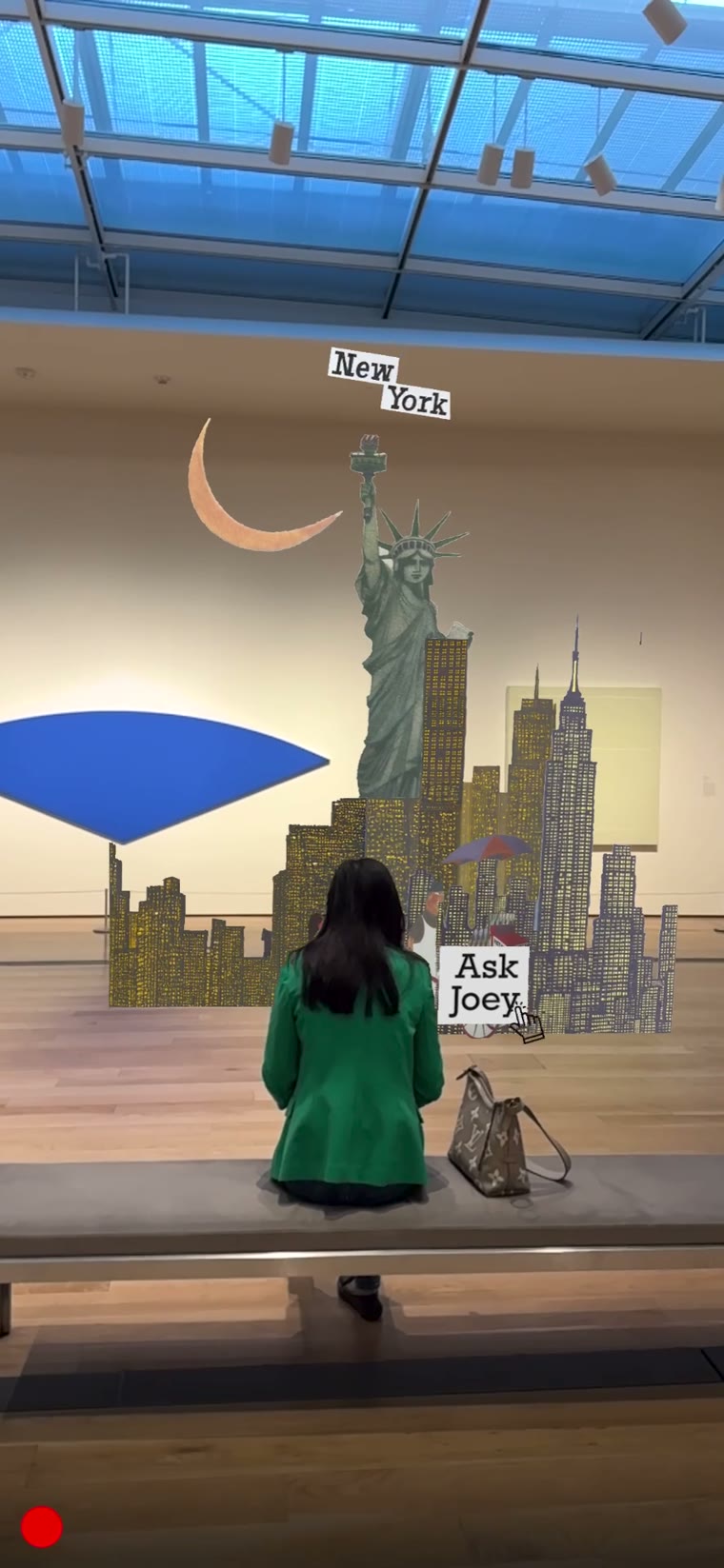 Visitor with the book in a gallery space